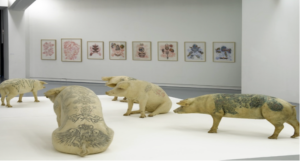 Wim Delvoye, dövme yapılmış ve tahnit işlemi uygulanmış domuzlar, 2010